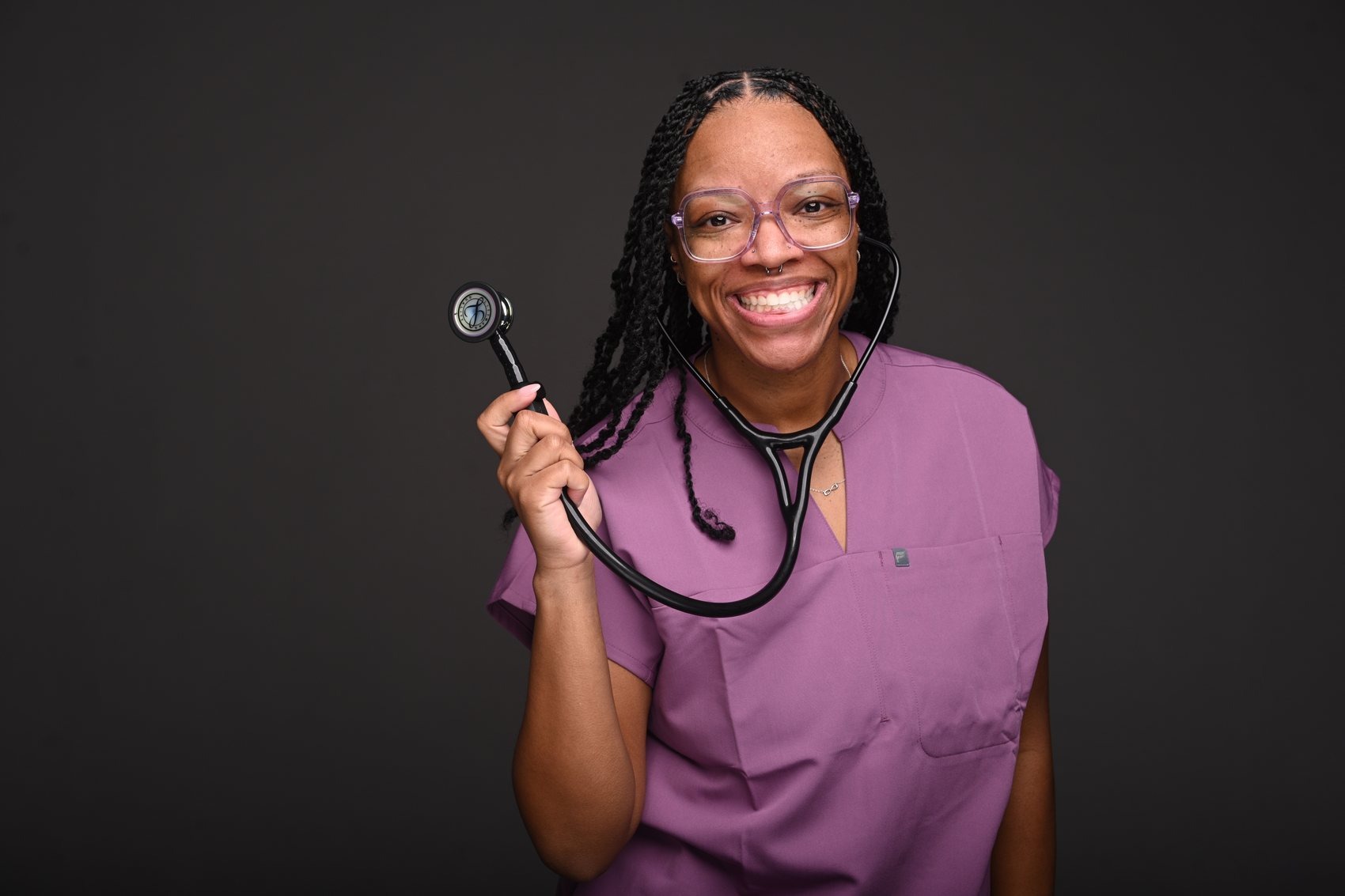 Dr. DeVontee' Rayford, DNP, CRNA, stethoscope in hand